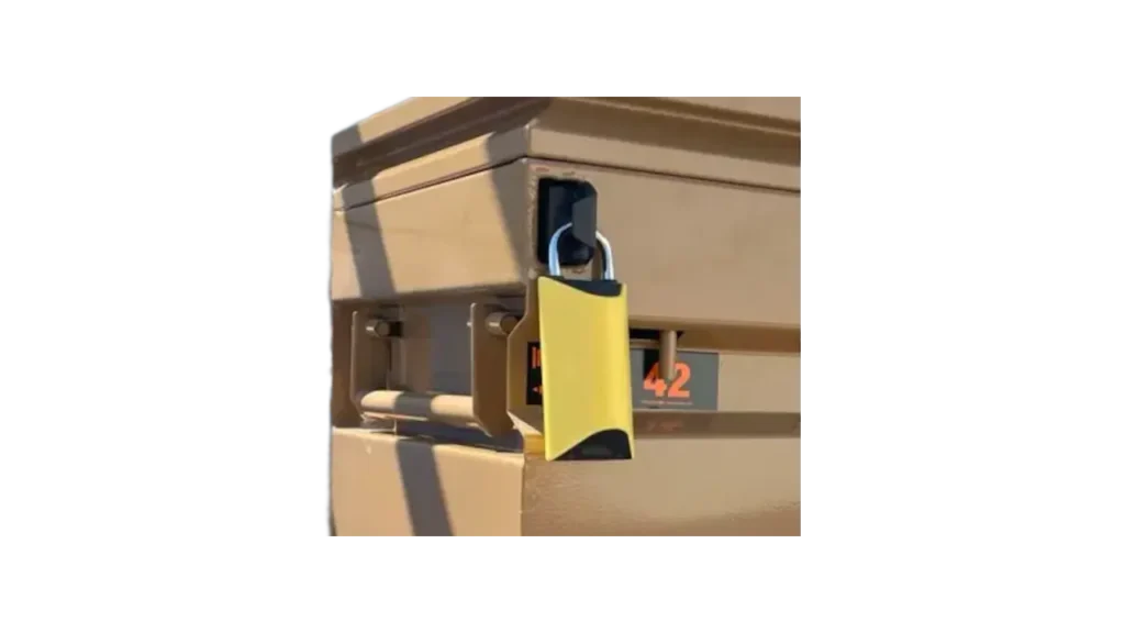 Close-up photograph of a yellow BoxLock smart padlock secured to a storage bin.