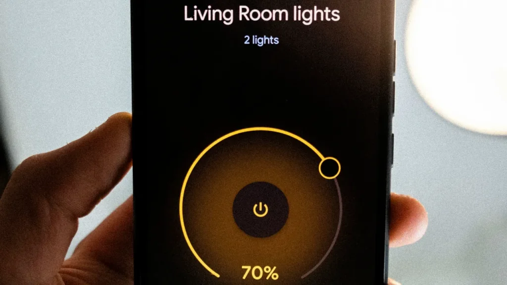 Smartphone screen displaying a smart home app controlling living room smart lights.
