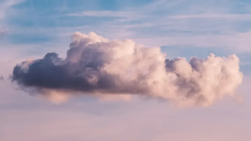 A soft white cloud floating in a blue sky, representing cloud computing.