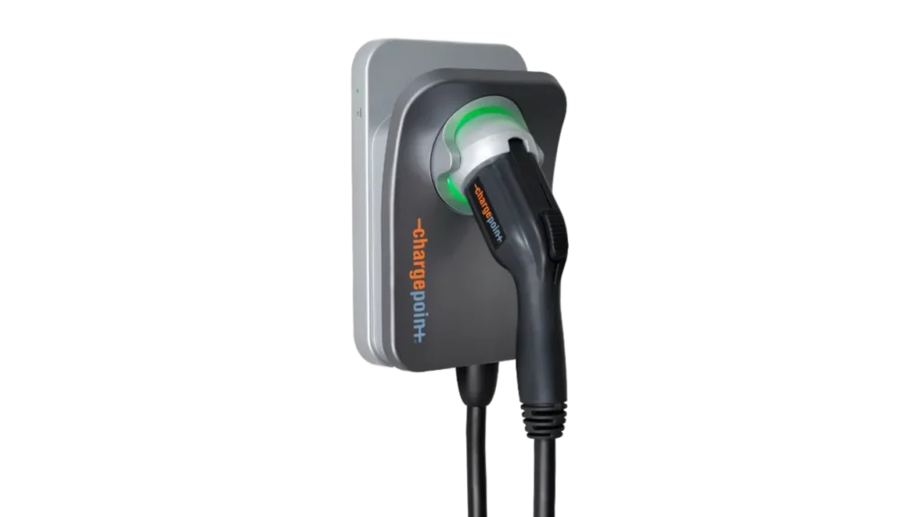 ChargePoint Home Flex EV charger wall unit with the black handle docked and a glowing green LED indicator ring.