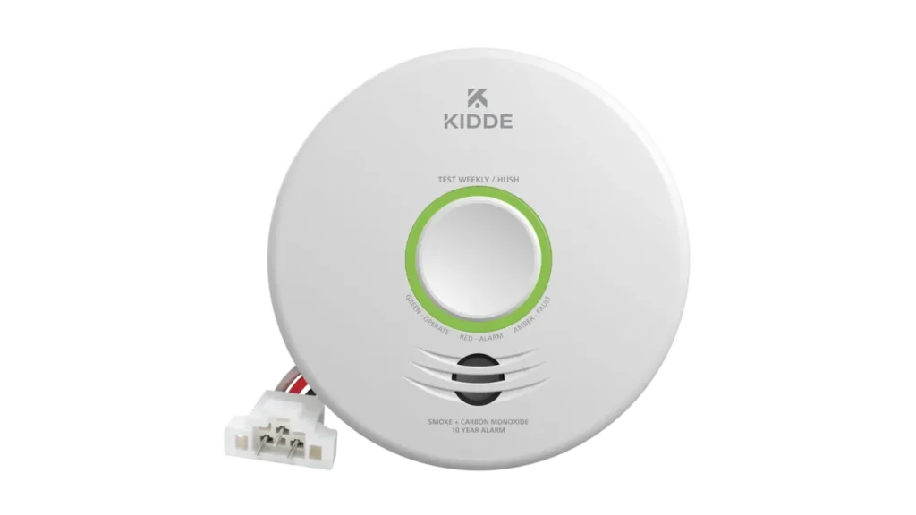 Kidde smart smoke and carbon monoxide alarm with green test and hush button ring.
