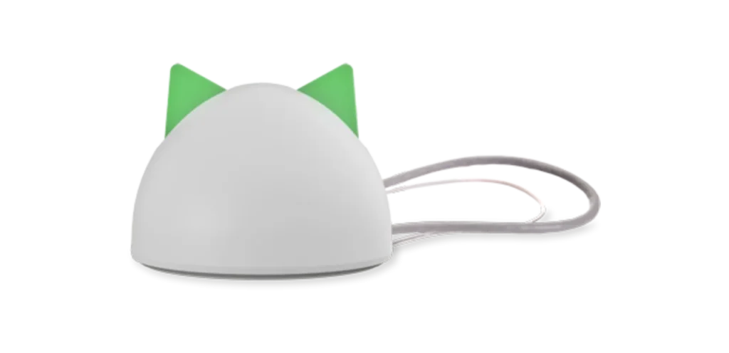 Small white Sure Petcare Hub with green ear accents and connecting cables.