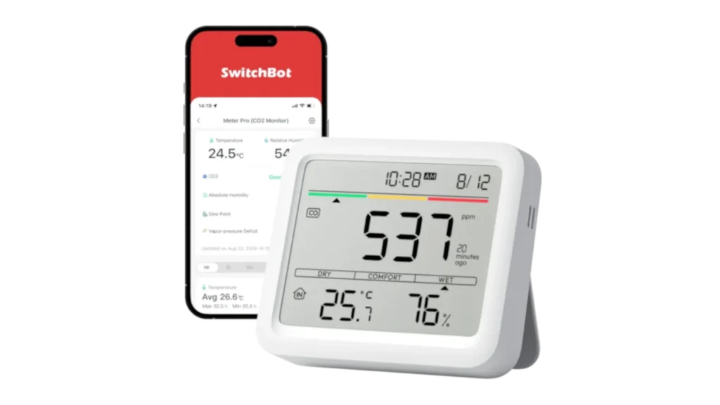 SwitchBot Meter Pro CO2 monitor displaying 537 ppm beside the SwitchBot app showing temperature and humidity.