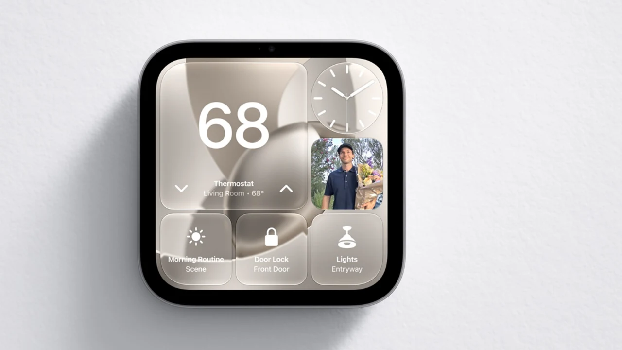 Wall-mounted Apple HomeView showing thermostat, door lock, lights and a camera preview